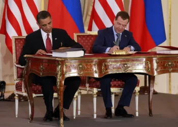 President Barack Obama, left, and Russian President Dmitry Medvedev sign the New START treaty at the Prague Castle in Prague on April 8, 2010.
