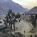 Stranded trucks loaded with supplies for Afghanistan, park in a terminal along side on a highway after Afghan Taliban rulers closed a key border crossing point Torkham, in Landi Kotal