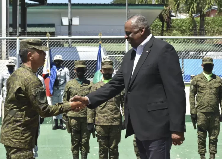 <strong>U.S Defense Secretary In Philippines To Discuss Deployment Of More American Troops</strong> 1 In this handout photo provided by the Command Public Information Office, Western Mindanao Command, U.S. Defense Secretary Lloyd Austin III, right, greets Western Mindanao Commander Lt. Gen. Roy Galido as he visits Camp Don Basilio Navarro in Zamboanga province, southern Philippines