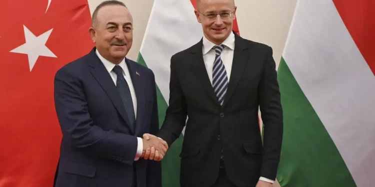 <strong>Sweden Should ‘Act Differently’ To Join NATO – Hungary’s Foreign Minister</strong> 1 Hungarian Minister of Foreign Affairs and Trade Peter Szijjarto, right, receives Foreign Minister of Turkey Mevlut Cavusoglu for talks in his office in Budapest, Hungary