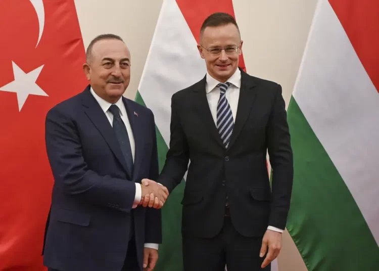<strong>Sweden Should ‘Act Differently’ To Join NATO – Hungary’s Foreign Minister</strong> 1 Hungarian Minister of Foreign Affairs and Trade Peter Szijjarto, right, receives Foreign Minister of Turkey Mevlut Cavusoglu for talks in his office in Budapest, Hungary