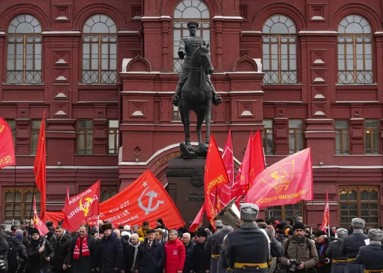 <strong>Putin Commemorates Battle Of Stalingrad</strong> 1 Communist's party supporters with Red flags gather around the statue of Soviet Marshal Georgy Zhukov after a wreath-laying ceremony at the Tomb of the Unknown Soldier near the Kremlin Wall