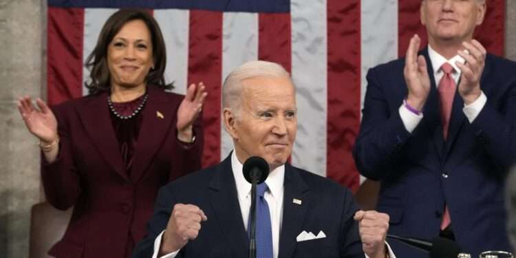 President Joe Biden delivers the State of the Union address to a joint session of Congress at the U.S. Capitol, Tuesday, Feb. 7, 2023, in Washington, as Vice President Kamala Harris and House Speaker Kevin McCarthy of Calif., applaud.