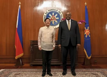 U.S. Secretary of Defense Lloyd James Austin III, right, poses with Philippine President Ferdinand Marcos Jr during a courtesy call at the Malacanang Palace in Manila, Philippines