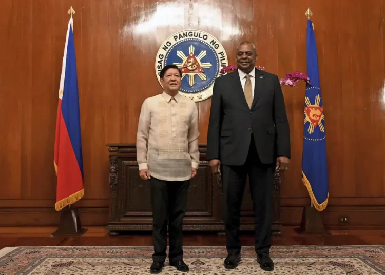 <strong>US, Philippines Agree On Larger American Military Presence</strong> 1 U.S. Secretary of Defense Lloyd James Austin III, right, poses with Philippine President Ferdinand Marcos Jr during a courtesy call at the Malacanang Palace in Manila, Philippines