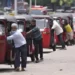 Auto rickshaw drivers line up to buy gas near a fuel station in Colombo, Sri Lanka, Wednesday, April 13, 2022.