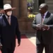Ugandan President Yoweri Museveni, left, and his South African counterpart Cyril Ramaphosa meet during a welcoming ceremony in Pretoria, South Africa, Tuesday, Feb. 28, 2023.