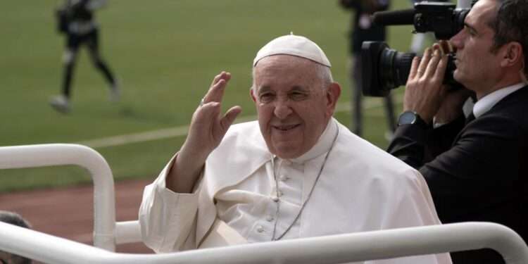 Pope Francis waves at worshipers at the Martyrs’ Stadium in Kinshasa, Congo