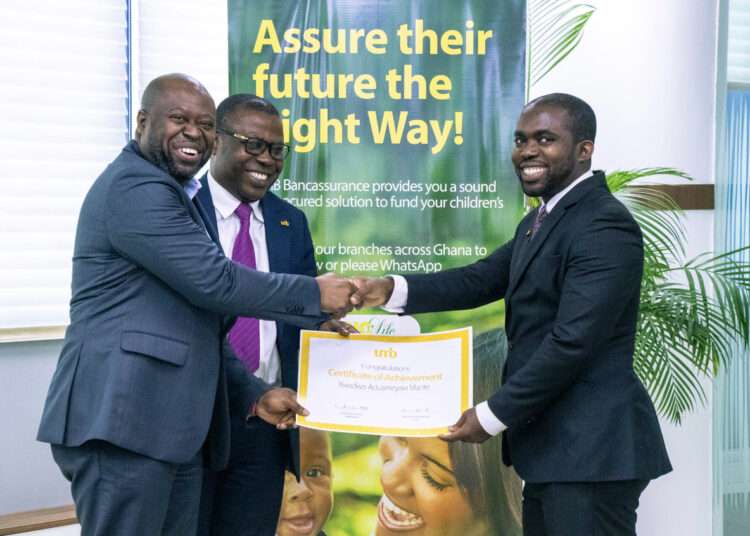 Kwadwo Aduameyaw Mante, Corporate Credit Officer of Universal Merchant Bank receiving his best student award qualifying him an educational trip to Kenya