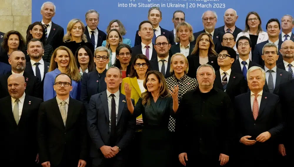 Countries Urged To Support ICC’s Probe In Ukraine 1 A family photo of those attending the International Justice Minister's Conference at Lancaster House in London, Monday, March 20, 2023. Including at front Dominic Rabb, Britain's Deputy Prime Minister and Minister of Justice, 3rd left, Minister of Justice and Security of the Netherlands, Minister Dilan Yesilgöz-Zegerius , 3rd right, Minister of Justice of Ukraine, Denys Maliuska, 2rd left, Prosecutor General of Ukraine, Andriy Kostin, 2nd right, Karim Khan KC, Prosecutor of the ICC,left, and The European Commissioner, Dider Reynders at right.