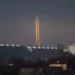 Three Russian rockets launched against Ukraine from Russia's Belgorod region are seen at dawn in Kharkiv, Ukraine
