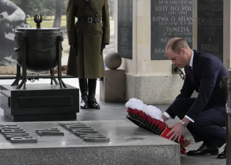 Prince William Honors Poles Who Died In Past Wars In Warsaw 1 Britain's Prince William lays a wreath of flowers at the Tomb of the Unknown Soldier in Warsaw, Poland, Thursday, March 23, 2023.