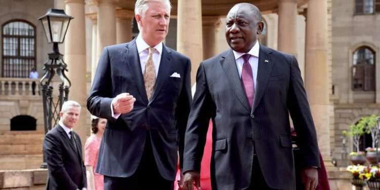 King Philippe of Belgium, left, is welcomed by South African President Cyril Ramaphosa in Pretoria, South Africa, Thursday, March 23, 2023.