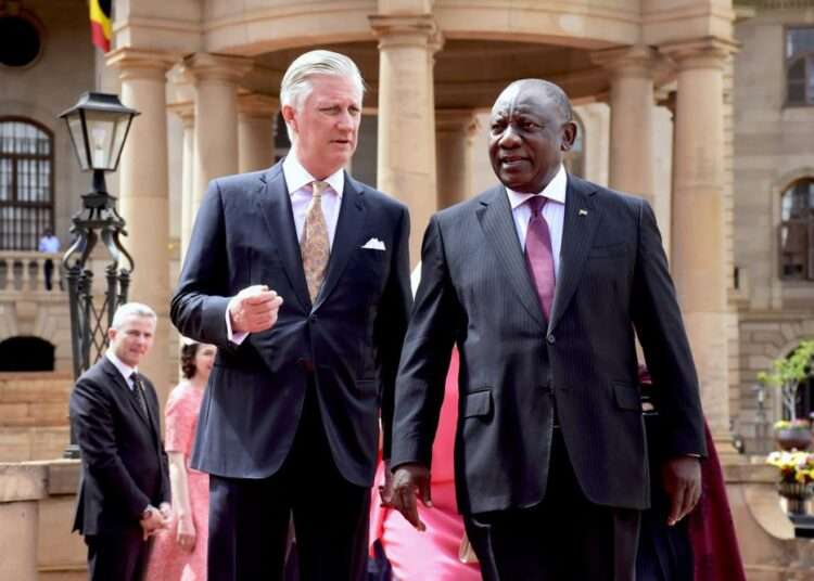 King Philippe of Belgium, left, is welcomed by South African President Cyril Ramaphosa in Pretoria, South Africa, Thursday, March 23, 2023.