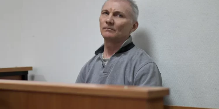 Russia Convicts Father Of Teen Who Drew Anti-war Picture 1 Alexei Moskalyov sits in a courtroom in Yefremov, Tula region, some 300 kilometers (186 miles) south of Moscow, Russia, Monday, March 27, 2023.