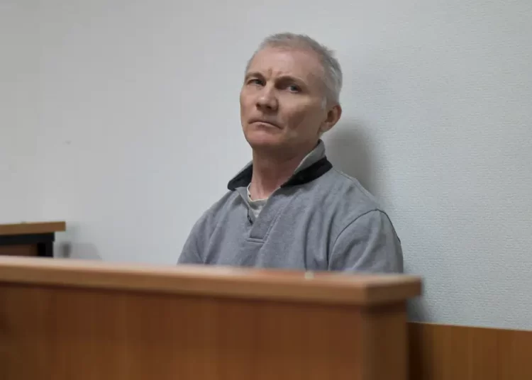 Russia Convicts Father Of Teen Who Drew Anti-war Picture 1 Alexei Moskalyov sits in a courtroom in Yefremov, Tula region, some 300 kilometers (186 miles) south of Moscow, Russia, Monday, March 27, 2023.
