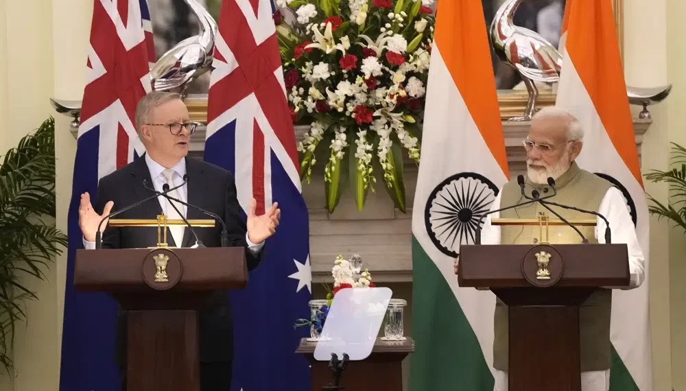 Australia, India Aim To Strengthen Security And Economic Ties 1 Indian Prime Minister Narendra Modi watches as his Australian counterpart Anthony Albanese makes a press statement, in New Delhi, India, Friday, March 10, 2023.