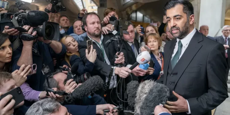 Humza Yousaf speaks to the media after being voted the new First Minister at the Scottish Parliament in Edinburgh, Scotland, Tuesday March 28, 2023.