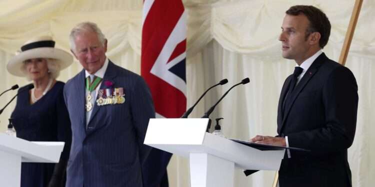 King Charles’ Visit To France Postponed 1 Then Britain's Prince Charles and Camilla, Duchess of Cornwall look on as French President Emmanuel Macron, right, makes a speech following laying a wreath at a ceremony at Carlton Gardens in London, Thursday June 18, 2020.