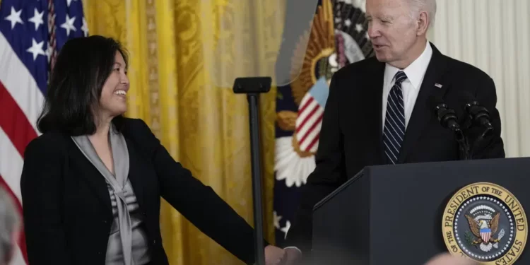 President Joe Biden talks about his nomination of Julie Su, left, to serve as the Secretary of Labor during an event in the East Room of the White House in Washington, Wednesday, March 1, 2023.