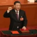 Chinese President Xi Jinping takes his oath after he is unanimously elected as President during a session of China's National People's Congress (NPC) at the Great Hall of the People in Beijing, Friday, March 10, 2023.