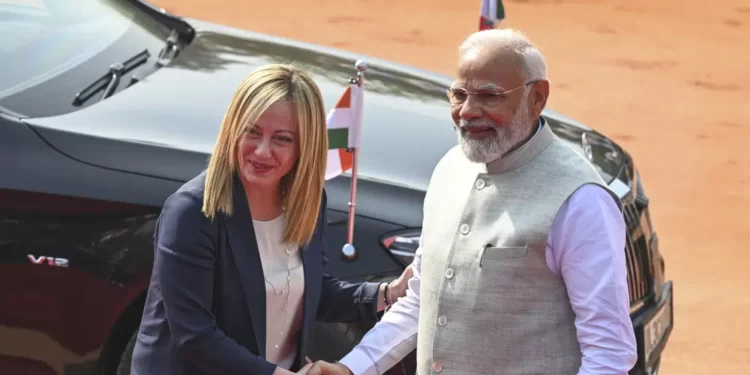 Italy’s Prime Minister Urges India To Play Key Role In Ending Russia-Ukraine War 1 Italian Premier Giorgia Meloni, left, is received by Indian Prime Minister Narendra Modi