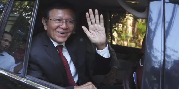 Cambodian Opposition Leader Sentenced To 27 Years Imprisonment 1 Former President of Cambodia National Rescue Party, Kem Sokha, waves from his car