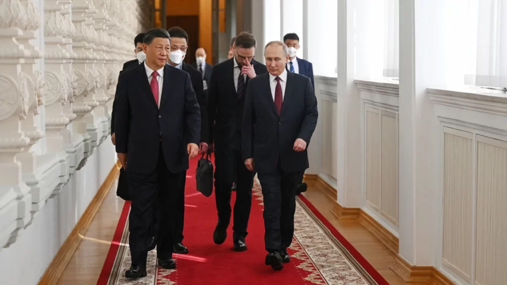 President Putin walks with his Chinese counterpart Xi Jinping at the Kremlin in Moscow on March 21 2023.