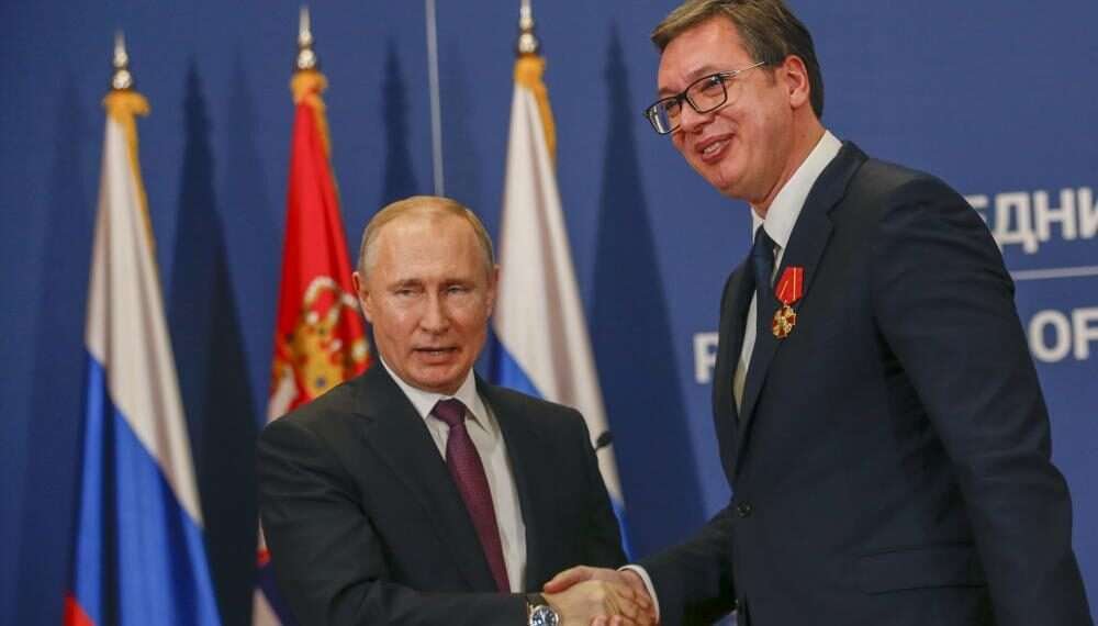 Serbia’s President Criticizes ICC’s Arrest Warrant For Putin 1 Russian President Vladimir Putin, left, shakes hands with Serbian President Aleksandar Vucic after being awarded the Order of Alexander Nevsky in Belgrade, Serbia, Thursday, Jan. 17, 2019.