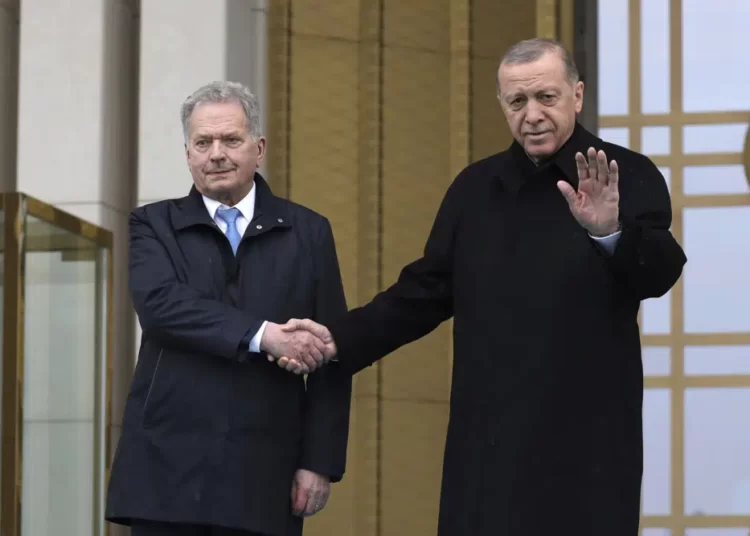 Finland's NATO Bid Secures Erdogan's Backing 1 Turkish President, Recep Tayyip Erdogan, right, and Finland's President Sauli Niinisto shake hands during a welcome ceremony at the presidential palace in Ankara, Turkey, Friday, March 17, 2023.