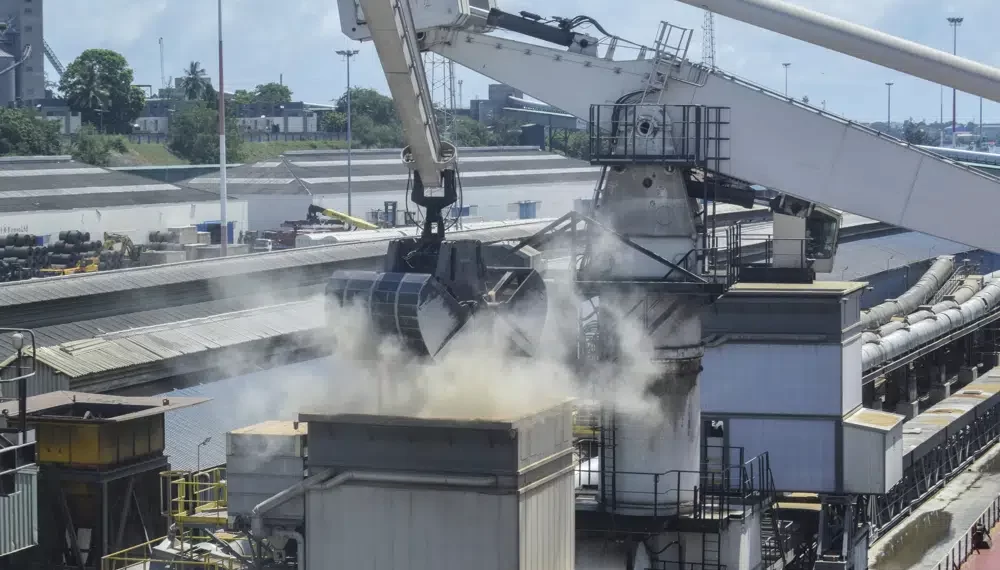 Grain is offloaded from the Eaubonne bulk carrier ship after it docked in the port of Mombasa, Kenya on Nov. 26, 2022.