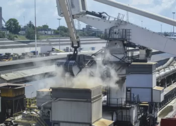 Grain is offloaded from the Eaubonne bulk carrier ship after it docked in the port of Mombasa, Kenya on Nov. 26, 2022.