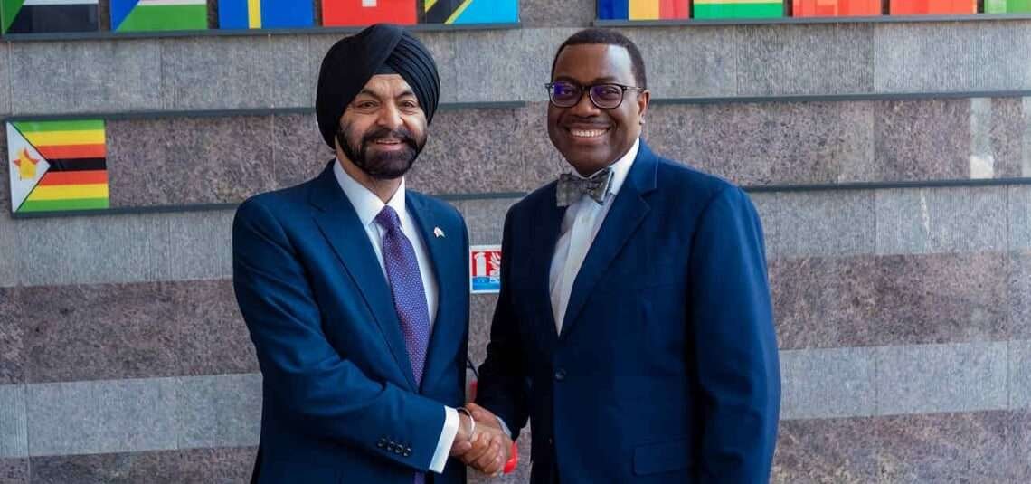 Ajay Banga, US nominee for World Bank Group President (left) and Akinwumi Adesina, African Development Bank President (right) in Abidjan.