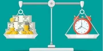 clock money on balance scales 260nw 1439903447