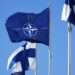 Finland Joins NATO 11 NATO flag, centre, and Finland flags flutter over the building of Ministry of Foreign Affairs in Helsinki, Finland, Tuesday, April 4, 2023.