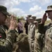 Philippines Names 4 New Camps For U.S Forces 13 Philippine Army Artillery Regiment Commander Anthony Coronel, left, returns a salute from a US soldier during a joint military drill called Salaknib at Laur, Nueva Ecija province, northern Philippines on Friday, March 31, 2023.