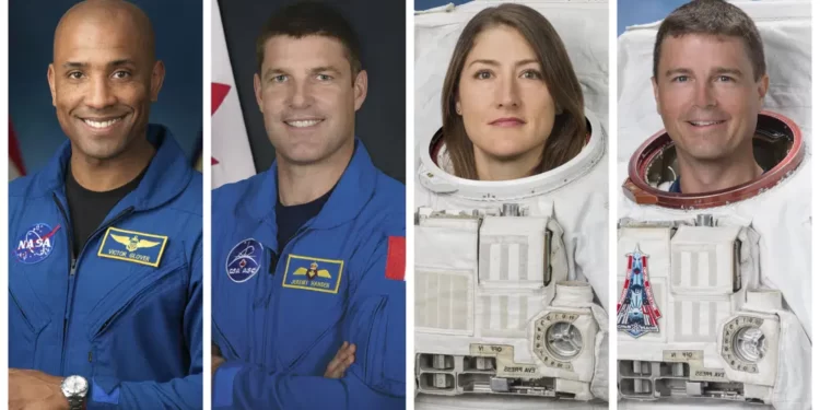 This combination of photos shows, from left, astronauts Victor Glover, Jeremy Hansen, Christina Koch, and Reid Wiseman.