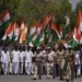 Indian Opposition Lawmakers Protest Against Modi Government 12 Opposition Lawmakers carry big national flag take out a protest march from Indian Parliament House, in New Delhi, India, Thursday, April 6, 2023.