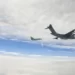 In this image taken from video footage run Saturday, April 8, 2023 by China's CCTV, a Chinese fighter jet performs an mid-air refueling maneuver at an unspecified location.