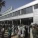 Yemeni gather at the airport ahead of a prisoners exchange in Sanaa, Yemen, Friday, April 14, 2023.