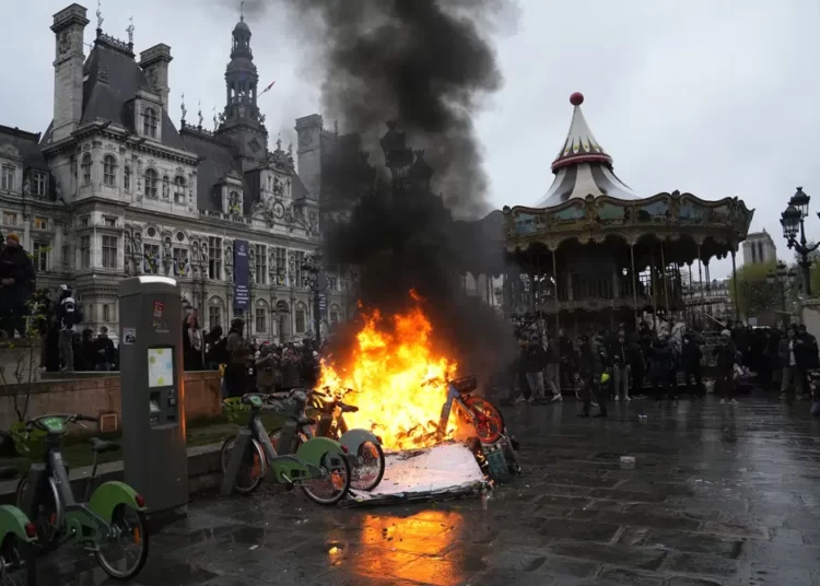<strong>Quest To Have A Competitive Economy</strong> 1 Bicycles burn during a protest outside the Paris City Hall, Friday, April 14, 2023 in Paris.