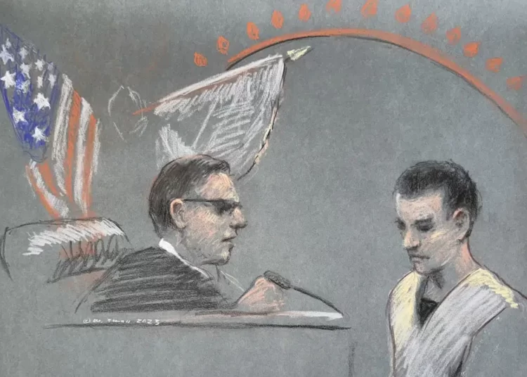 Massachusetts Air National Guardsman Jack Teixeira, right, appears in U.S. District Court in Boston, Friday, April 14, 2023.