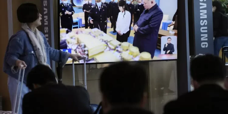 North Korea Builds Its First-Ever Military Spy Satellite 1 A TV screen shows an image of North Korean leader Kim Jong Un, right, and his daughter during a news program at the Seoul Railway Station in Seoul, South Korea, Wednesday, April 19, 2023.