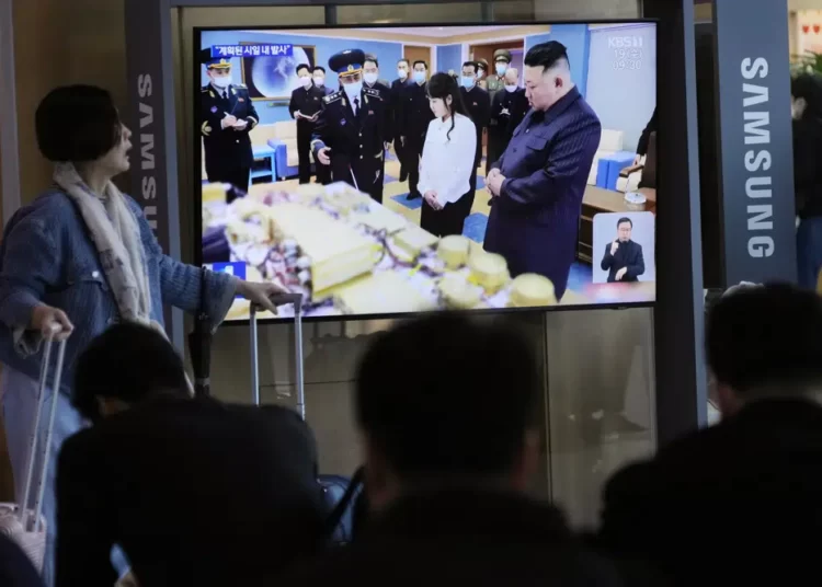 North Korea Builds Its First-Ever Military Spy Satellite 1 A TV screen shows an image of North Korean leader Kim Jong Un, right, and his daughter during a news program at the Seoul Railway Station in Seoul, South Korea, Wednesday, April 19, 2023.