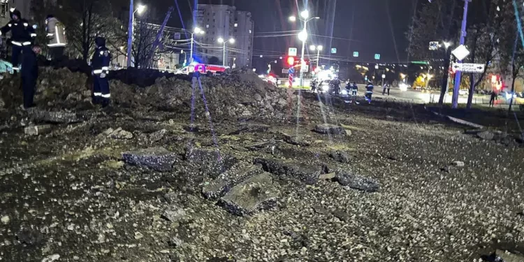 This handout photo released by Telegram Channel of Belgorod Region Governor Vyacheslav Gladkov shows the site of the crater after an explosion in Belgorod, Russia, Friday, April 21, 2023.