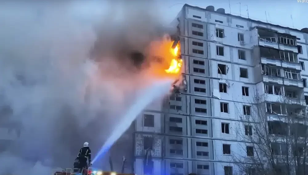 In this image taken from video provided by the National Police of Ukraine, firefighters work at an apartment building destroyed by a Russian attack in the town of Uman, around 215 kilometers (134 miles) south of Kyiv, Ukraine, Friday, April 28, 2023.