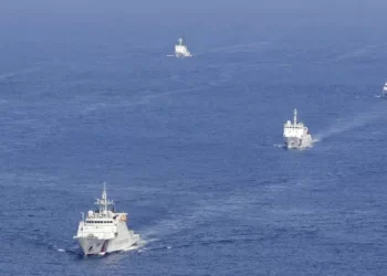 our China coast guard vessels, right, are followed by Japan coast guard ships as they intruded into Japan's territorial waters near the disputed East China Sea islands called Senkaku by Japan and Diaoyu by China on Sept. 10, 2013.