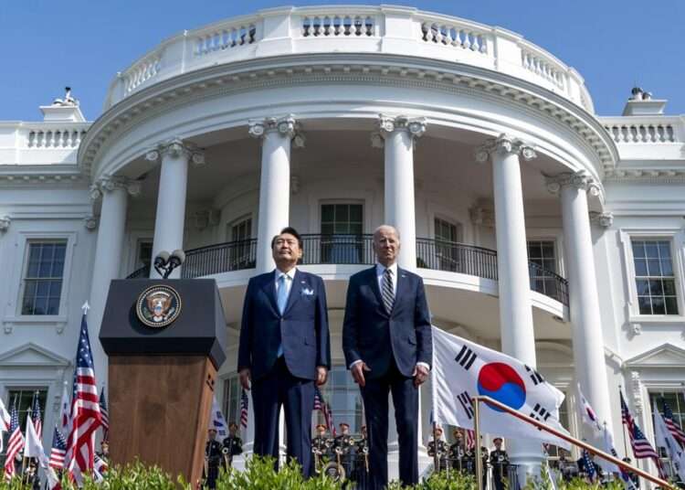 U.S, South Korea Unveil New Nuclear Deterrence Plan 1 President Joe Biden and South Korea's President Yoon Suk Yeol stand as their two country's national anthems are played during a State Arrival Ceremony on the South Lawn of the White House in Washington.