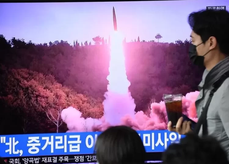 North Korea ICBM Launch Sparks Alarm In Japan 1 A TV screen is seen reporting North Korea's missile launch.