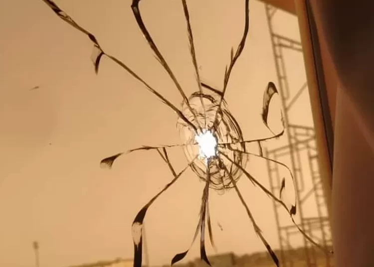 <strong>The Unsung Heroes Keeping Civilians Alive In Khartoum</strong> 1 A gun shut through a glass window